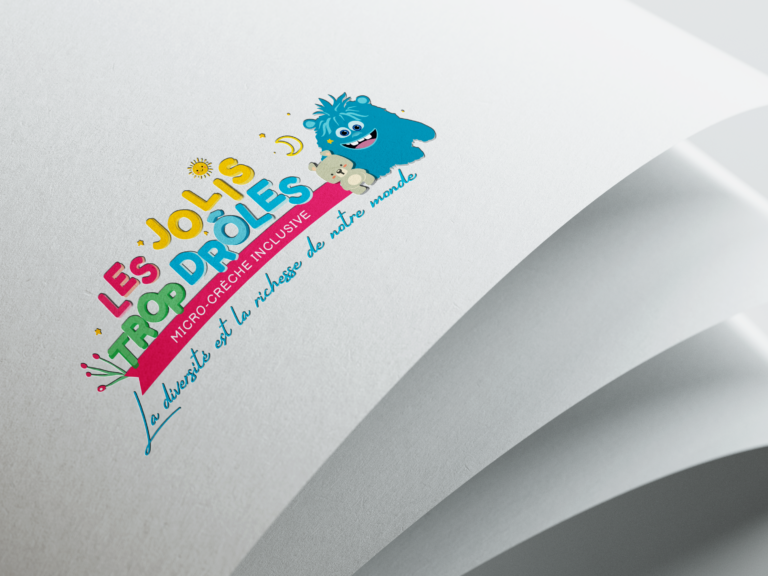 Logo Les Jolis Trop Drôles sur support papier. Création de logo Nexphasis Indre.